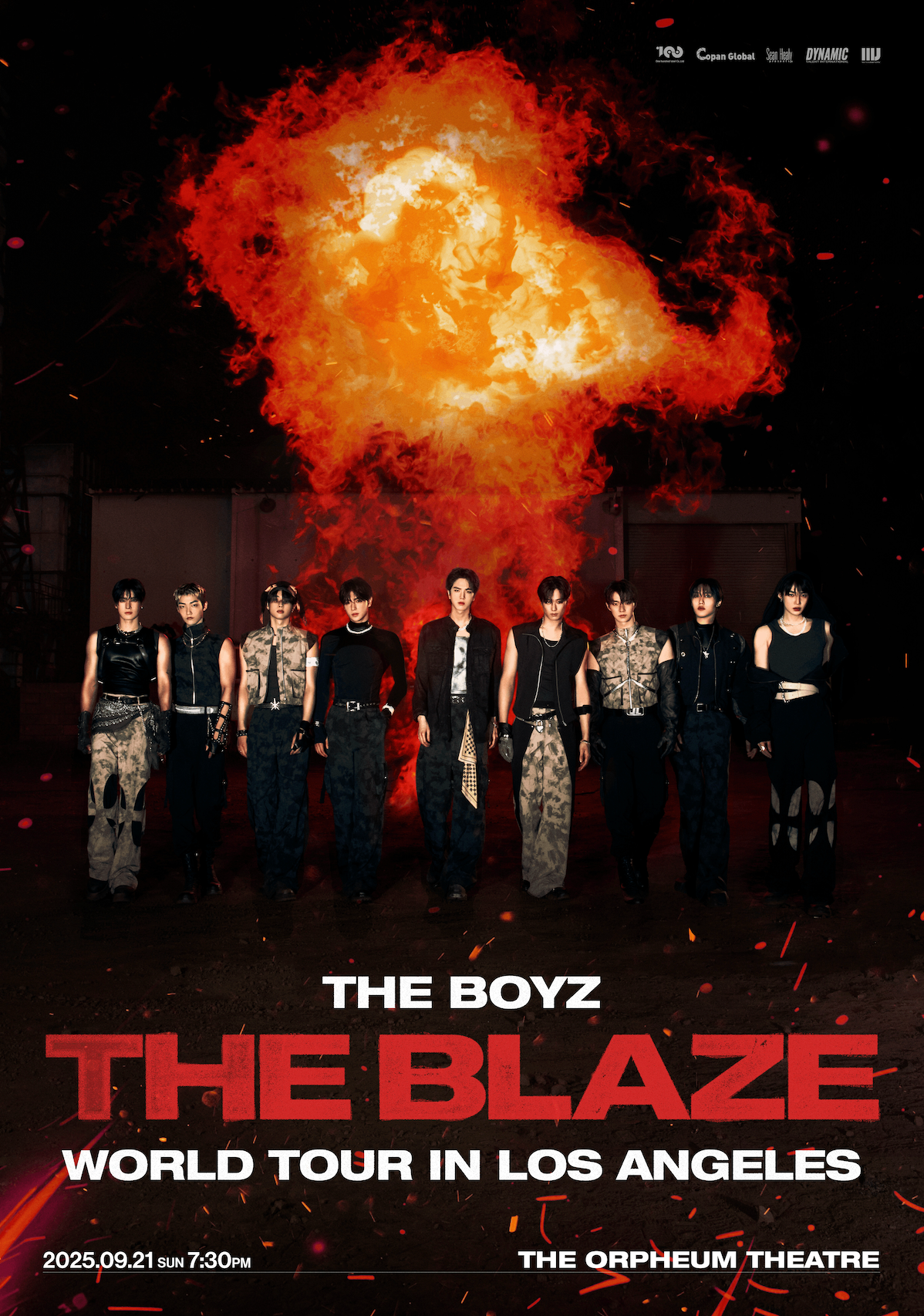 Promotional poster for 'The Blaze' world tour by The Boyz with a fiery explosion in the background.