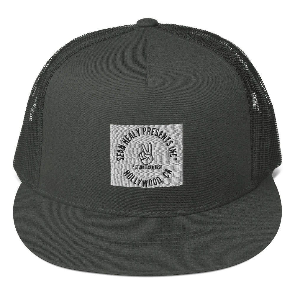 A charcoal grey snapback hat with a flat visor, featuring an embroidered logo on the front, mesh back panel, and a plastic snap closure.